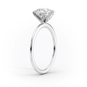 The Petal Kamellie Set With A 4 Carat Pear Moissanite