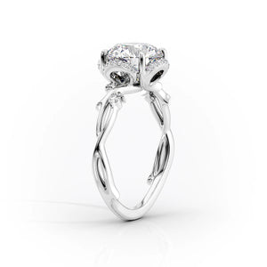 The Halo Twig Set With A 2 Carat Elongated Cushion Moissanite