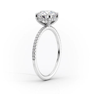 The Pave Crown Kamellie Set With A 1 Carat Pear Moissanite